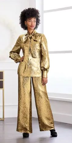 Mod Wide-Leg Pant Shine on in this timeless jacquard pant! Classic wide-leg pant has side-back elastic waist and back zip. 30" inseam. Nonstretch. Polyester/metallic/cotton; polyester lining; machine wash. Imported.Make a statement with this stunning gold metallic 2-piece pant suit from Ashro. Perfect for any formal occasion, this suit features a top and pants set with a beautiful metal-themed design. The size 16 top and 16W pants are tailored for a regular fit, making it ideal for women of all Elegant Gold Long Sleeve Sets, Tailored Long Sleeve Party Sets, Elegant Formal Pantsuit For Party Season, Tailored Long Sleeve Sets For Evening, Spring Party Pantsuit With Suit Collar, Gold Long Sleeve Suits For Work, Elegant Gold Party Suit, Gold Elegant Party Suits, Tailored Long Sleeve Evening Pantsuit