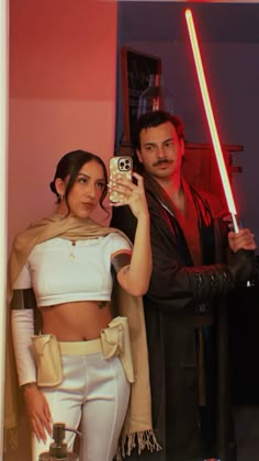 a man and woman dressed up as star wars characters