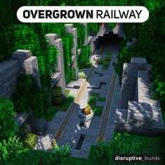 an overhead view of a train track in the middle of a forest with trees and bushes