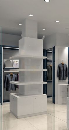 an empty walk in closet with clothes on shelves