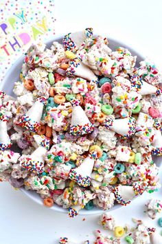 a bowl filled with sprinkles and lots of candy