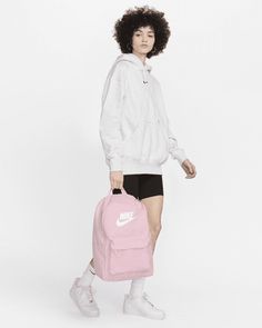 Take your gear to go with the Nike Heritage Backpack. Its spacious main compartment features a sleeve that holds up to a 15" laptop, so your computer is never out of reach. 2 zippered accessories pockets help keep your gear organized and easy to grab. This product is made with at least 65% recycled polyester fibers. Shown: Pink Foam/Pink Foam/White Style: DC4244-664 Nike Heritage Backpack, Gear Organizer, Out Of Reach, Heritage Backpack, Hold Ups, White Style, Laptop, Computer, Backpacks