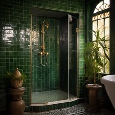 a green tiled bathroom with a walk in shower