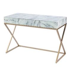 a white marble top table with gold metal legs and a drawer on the left side