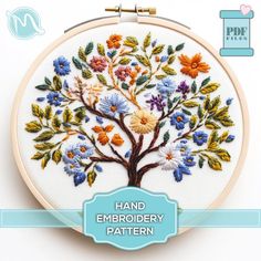 an embroidery pattern with a tree on it and the words hand embroidery pattern written below