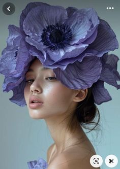 a woman with purple flowers on her head