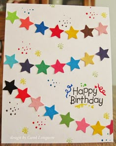 a birthday card with colorful stars on it