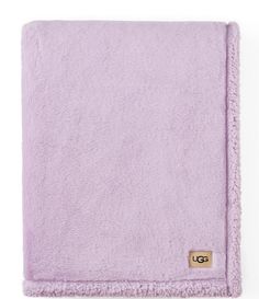 a purple blanket with the letter gg on it