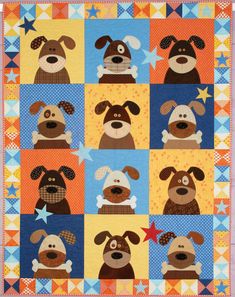 a quilt with dogs on it and stars in the background