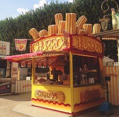 a food stand with corn on top