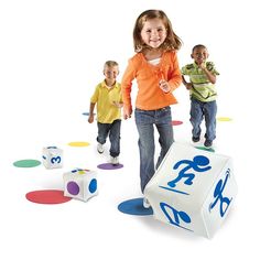 three children are playing with an interactive toy that is designed to look like a box