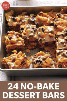 a pan filled with dessert bars on top of a table