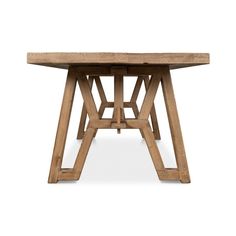 a wooden table with two intersecting legs on the top and one leg raised up to the ground