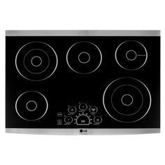 an electric cooktop with four burners on the front and two knobs on the side