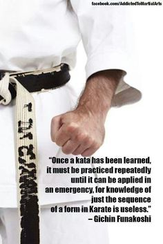 a man in karate attire holding his hand with a quote on the image above it