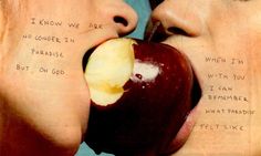 a woman biting into an apple with writing on it