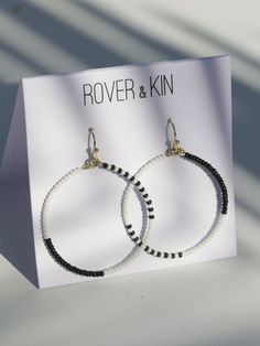 Asymmetrical and fun monochrome beaded hoops for a simple and unexpected look. Fair trade Handcrafted in India Hypoallergenic and nickel free brass + glass beads Measures 2" in length Trendy Nickel-free Beaded Earrings For Everyday, Minimalist Beaded Earrings With Round Beads For Everyday, Everyday Minimalist Beaded Hoop Earrings, Minimalist Small Hoop Beaded Earrings For Everyday, Trendy Black Bead Jewelry For Everyday, Trendy Everyday Beaded Earrings, Minimalist Small Hoop Beaded Jewelry, Minimalist Beaded Hoop Jewelry, Things To Do After Exams