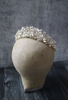 a headpiece with pearls on it