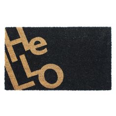 a black and gold door mat with the word hello on it