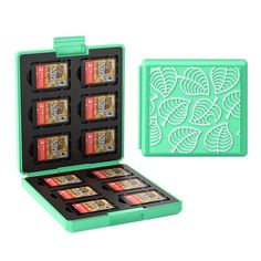 a green box with six different types of candy in it