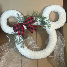 a wreath made to look like mickey mouse ears