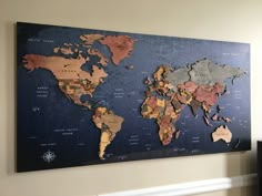 a world map is hanging on the wall