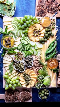 a table topped with lots of different types of food