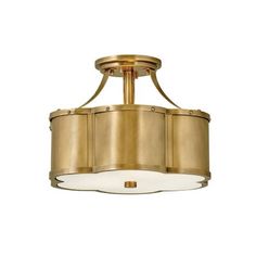 a semi - flush ceiling light fixture in an antique brass finish