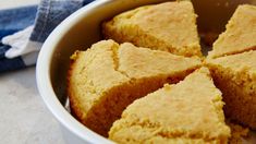 a pan filled with cornbread on top of a table