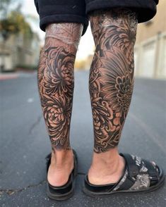 a person with tattoos on their legs and feet