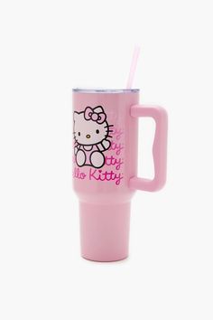 a pink hello kitty cup with a straw in it