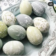 a plate filled with eggs sitting on top of a table