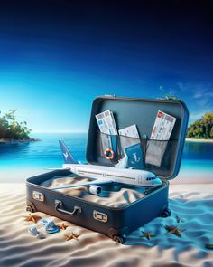 an open suitcase sitting on top of a sandy beach next to the ocean and island