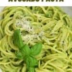 a plate of pasta with pesto and parmesan cheese on top, in front of the caption