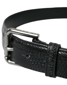 Discover the epitome of Italian craftsmanship with this exquisite belt from Dolce & Gabbana. Made from high-quality black leather, it features an elegant metal buckle, adding a touch of class and character to your ensemble. Perfect for bringing a refined finish to both formal and casual looks, this belt encapsulates luxury and style. Material: 100% LeatherColor: BlackWidth: 3cmLogo detailsMade in Italy Elegant Luxury Belt With Silver Buckle, Luxury Elegant Black Belt, Elegant Luxury Black Belts, Luxury Black Elegant Belt, Luxury Belts With Silver Buckle, Luxury Elegant Black Belt Buckles, Luxury Modern Belts With Silver Buckle, Luxury Modern Belt With Silver Buckle, Luxury Silver Belt For Men