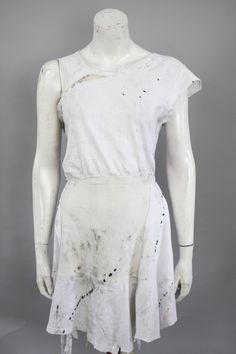 A light white dress, sewn from upcycled materials. It is the perfect wear for any festival-goer! Breezy, cute, but with a grunge edge.  Only one dress available! Size: Women's 4-6 (S) All of our clothes are handmade, which is why individual pieces may slightly differ from those shown in the photos. If you can't find your size or would like to customize this product according to your preferences, please don't hesitate to contact us. MORE APOCALYPTIC CLOTHES AND ACCESSORIES AT: https://www.etsy.co Summer Cotton Dresses For Alternative Fashion, Vintage Summer Dresses For Alternative Fashion, Wasteland Costume, Post Apocalyptic Outfit, Post Apocalyptic Costume, Festival Mode, Fury Road, Concept Clothing, Summer Attire