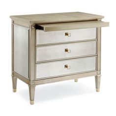 a mirrored chest with three drawers on one side and an open drawer on the other