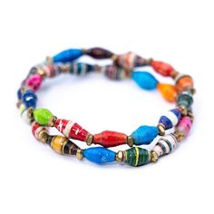 These fun bracelet is named after one of our partners and comes in a variety of colors. It is made of 100% recycled paper beads handcrafted by Masai women. In between each bead are beautiful faceted copper, brass, or silver spacers. They are perfect to stack with any of our other paper bead bracelets or mix it up with one of your own! How you can make a difference: Each bracelet provides 200,000 gallons of clean water. Just 5 bracelets = 1 water filter = 1 million gallons of clean water! :: Prod Paper Bead Bracelet, Paper Bracelet, Double Wrap Bracelet, Fun Bracelet, Linen Bag, Paper Beads, Clean Water, Colorful Bracelets, Recycled Paper