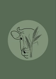 a drawing of a cow with ears of wheat in it's mouth on a green background