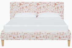 a bed with an upholstered headboard and foot board in front of a white background