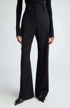 Crisp creases further the polished look of these high-rise wool pants designed in a flare-leg silhouette. 34" inseam; 24" leg opening; 14 1/2" front rise; 17" back rise (size 42) Zip fly with hook-and-bar closure Front scoop pockets 100% wool Dry clean Imported Designer Clothing Timeless Fitted Wide-leg Dress Pants, Elegant Wide Leg Wool Pants, Elegant Wool Wide Leg Pants, Luxury Wool Wide Leg Dress Pants, Elegant Wool Wide Leg Pants With Pressed Crease, Elegant Wide Leg Wool Bottoms, Classic Flare Dress Pants For Workwear, Flared Wide Leg Pants With Pressed Crease For Work, Luxury Wide Leg Dress Pants