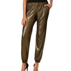 Gold Stretchy Harem-Style Pants With Black Undertones. Two Hand Pockets. Elastic Waistband. 29” Inseam. Fabric: Polyester, Spandex. Machine Wash. New Without Tags. Harem, Loose, Jogger Casual Party Bottoms With Elastic Waistband, Casual Stretch Gold Pants, Casual Fitted Gold Pants, Casual Gold Pants For Fall, Gold Fitted Casual Pants, Casual Stretch Gold Bottoms, Casual Gold Trousers, Casual Gold Pants For Workwear, Sparkly Pants