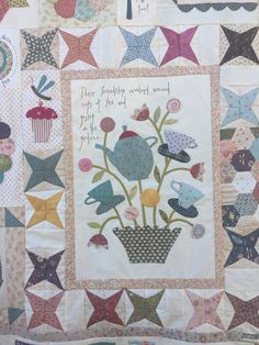 a quilted wall hanging with stars and flowers on it's sides that says, there is something wonderful around you