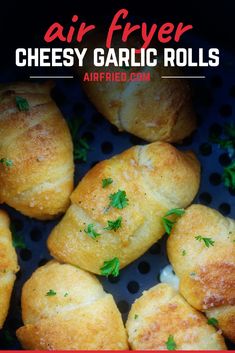 air fryer cheesy garlic rolls with parsley on top and text overlay that says air fryer cheesy garlic rolls