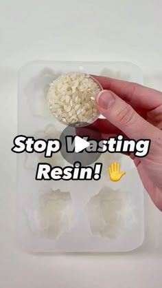 a hand holding a spoon with rice in it and the words stop vasting resinin