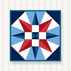 a red, white and blue star quilt is featured in this image with the background striped