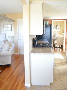 the kitchen is clean and ready to be used as a living room or dining area