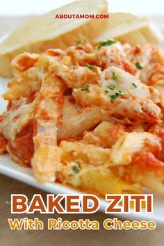 baked ziti with ricotta cheese on a white plate