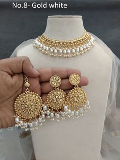 *Light Weight Gold Adjustable necklace set with earrings and tikka. *Studded with crystal stone. *Necklace width- 1.6 inches (Included drops) *Earrings length- 3.8 inches (included drops) *Earrings width- 1.9 inches Luxury Bridal Necklace For Puja And Diwali, Punjabi Wedding Jewelry Sets, Luxury Bridal Necklace With Gota Work For Diwali, Luxury Jewelry With Gota Work For Reception, Punjabi Jewelry, Wedding Gold, Bollywood Wedding, Indian Jewelry Sets, Polki Jewellery