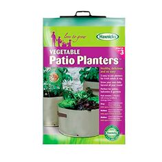 the planter bag is shown with plants in it